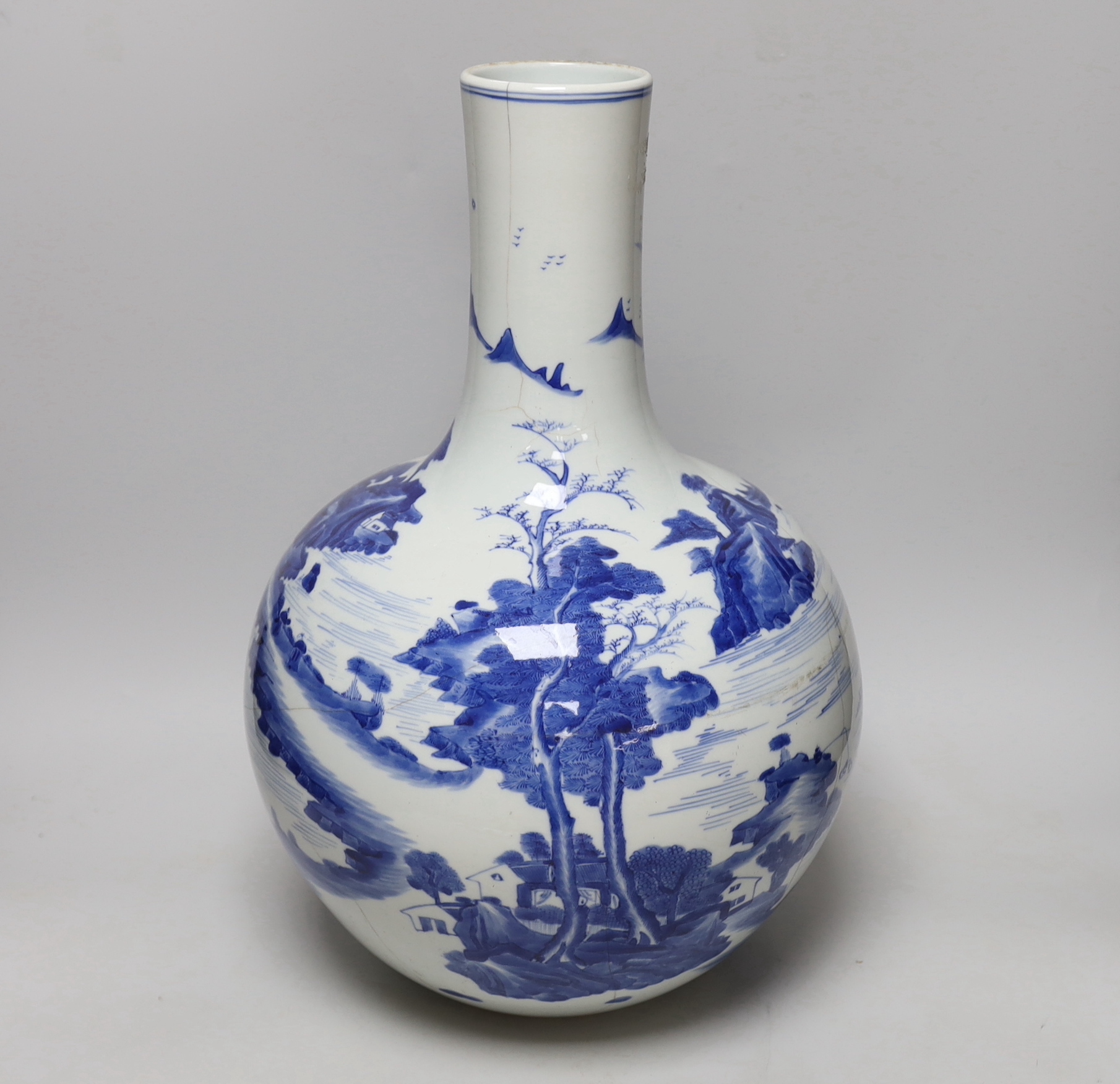 A large Chinese blue and white bottle vase, (a.f) 45cm